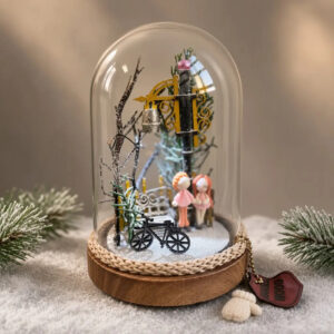 Decorative glass globe with a romantic winter theme 1